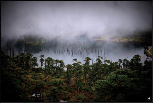 Shangarila lake-clouds keeps crossing over this lake with misty feel