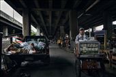 The main motorway divides the major banking district of Bangkok from the slums.: by moniquemontfroy, Views[569]