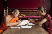 A long way from home two young Laotian monks are engrossed in their studies in one of the numerous monasteries in Chiang Mai in Thailand. They are two of the lucky ones who were allowed to go to Northern Thailand to get a better education. Most of the monks come from poor families who cannot support their child on their own and therefore send it to a monastery. : by monks, Views[248]