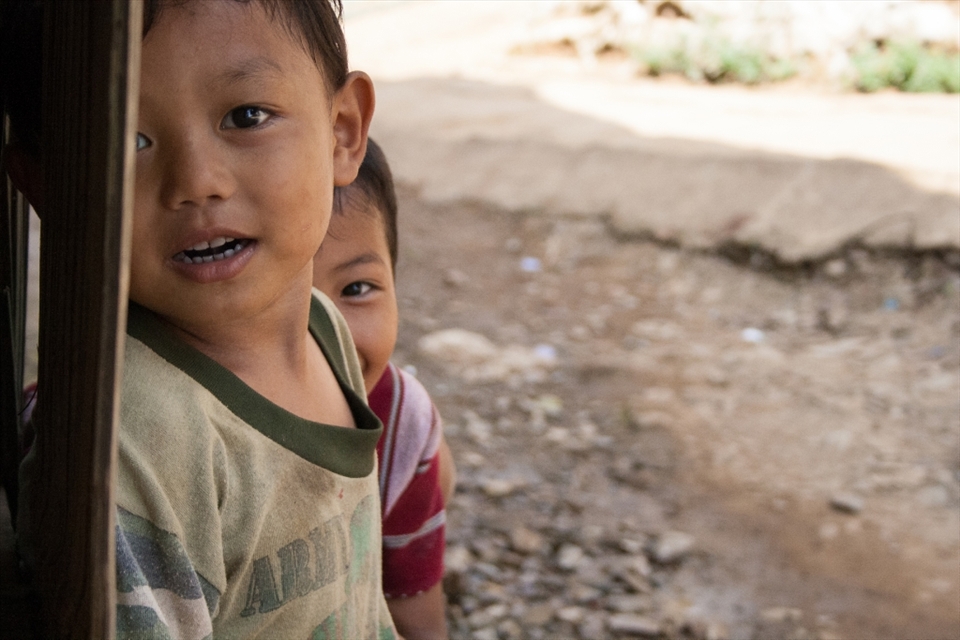 Hide and Seek with a camera.
Whenever these two young refugees saw the camera they sprinted away at top speed, but inevitably sneaked back to view every photograph.
