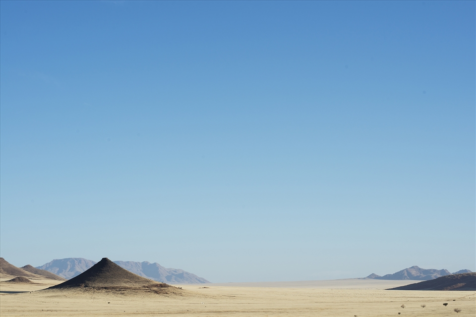 The Namibian Pyramid - 
A true sucess story in Namibian conservation efforts. Founded in 1992, the NamibRand Nature reserve covers over 2000km2 of former farm lands and shares a 100km border with the Namib-Naulkaft National Park. Financed by low impact eco tourism, the private game reserve has been restored with the removal of over 1500km of fencing, allowing native populations of fauna and flora to retake the landscape. Namibrand Nature Reserve, Namibia.