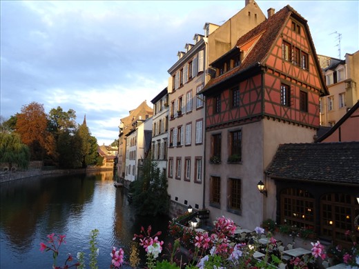 Its colors... joyful and uplifting like the colorful houses reflected on the waters of the river Ill...