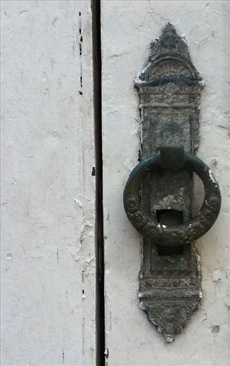As I looked at this door knocker I wondered who or what was behind the door.