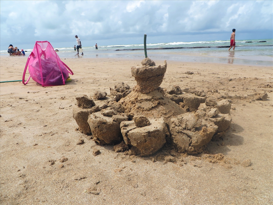 This is a sand sculpture made using coconut shells and left behind.