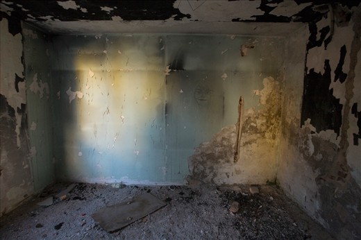 Many apartment buildings and homes such as this have been left untouched and in ruins off the fronts lines of where the Croats and Bosnians were fighting near 20 years ago. 