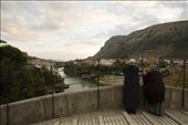 A couple standing on Stari Most Bridge. Stari Most, the connection between the two parts of the city, was destroyed in 1993 during the war after standing for 427 years. It was rebuilt in 2004 and now stands as a major tourist attraction for the city of Mostar.: by mostarwarremains, Views[673]