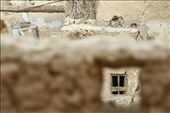 Old window in SHALI House, even with the current modernization of Siwa, some families still lives in their old SHALI Houses “6000 Years Old” and still doing renovation with the same mud brick materials used by their ancient ancestors.: by motagaly_entry, Views[995]