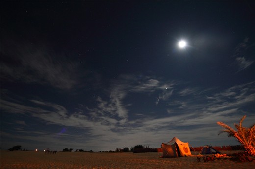 Siwa desert at night, the same desert is magnificent with its dynamic elements, at night the sun is replaced by the moon, and the beautiful sky is replaced with a darker one full of stars, a lot of touristic activities is done at night, including badawian night and dinner.