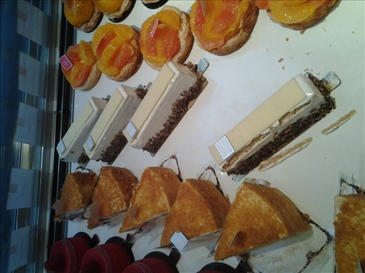 Oh look.A Parisian pastry is missing a top layer. Be a good Samaritan and help.