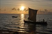 Fishermen using a traditional fishing boat and fishing methods call it a day and come home.: by mpandey, Views[187]