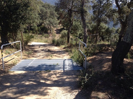 Welcome to Spain! Here are some cattle grates and steep gravel roads (would have been great on a mountain bike)