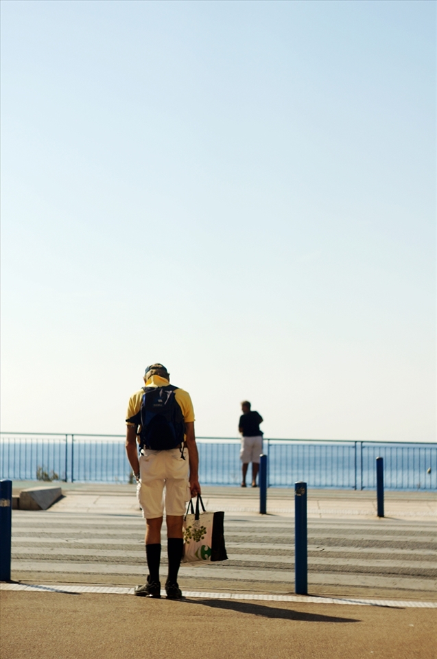 This old man stood in front of me when we all waited for the walking light. Strangely enough, even when the light turned green, and then red again, he still stood there. And strangely enough, my eyes are really sensitive to anything in yellow. He reminded me of Amelie Poulain's father. So I came and talked to him. “Sorry Mademoiselle, I am just sleepy. It is Monday, you know”- he laughed.