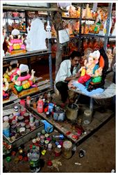 In India, you don't always need to travel to find God - he comes home ever Ganesh Chaturthi. Here, we see Lord Ganesha moortis in the making. Captured for life at Mumbai, India. : by munira_india, Views[915]