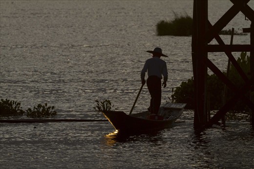 Fisherman at Inle Lake using the last light before going home