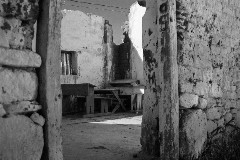 A forgoten class room, left behind to the spirits of education. The old desks, pilled up at mercy of the weather, gives us an idea of how is educated the people in an ignorant nation.With a government that have also forgotten them.