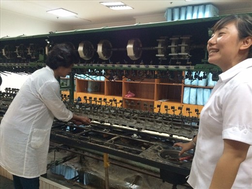 We went to a silk factory where we saw how they make silk thread and silk blankets. These are the machines that spin the silk thread.