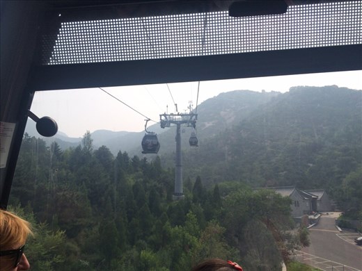 Taking the cable car up to the Great Wall