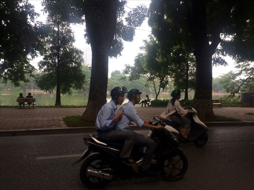 A view of Ho Kiem Lake in Hanoi (complete with mopeds whizzing by!)
