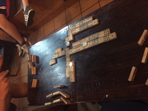 We got caught in the rain so we played dominoes