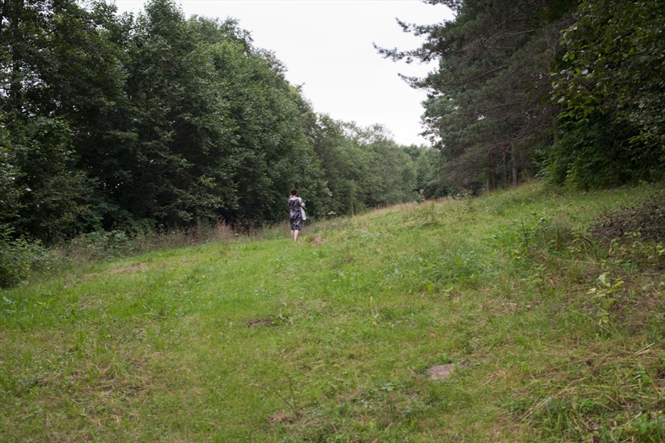 My sister is going for a swim in the lake.