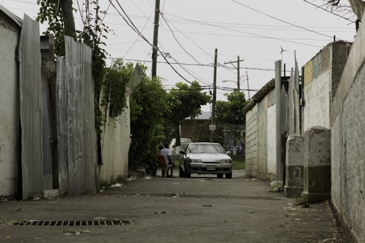 Today things are relatively peaceful, compared to a few years ago when a young man was shot and killed in broad day light by a lone gunman while walking on this street. Although the blood stains have since been washed away the events of that morning will forever soak into the minds and culture of the residents of Swallow Field. 