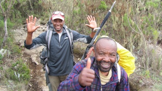 Our guides, Honest and Elegi ... excited that all 7 of us made the summit and were close to making it out in good health! (Considering we saw many people getting carried down the mountain on stretchers, this is a great accomplishment and a tribute to how good the SENE guides and crew took care of us!!)