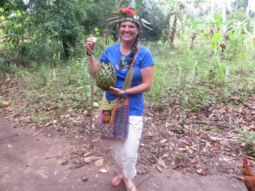 Decked out in all the jewelry and accessories they made me from the plants and spices at the farm!