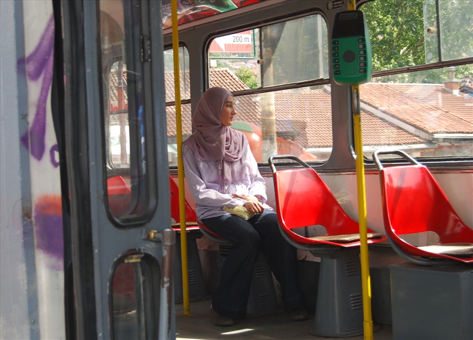 Girl from generation born during the war period, captivated in a Sarajevo train