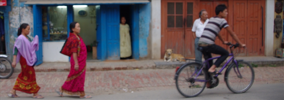 Kathmandu. My first days abroad produce a similar image to that of home. A lazy dog, a bike, men and women in natural routine. 
