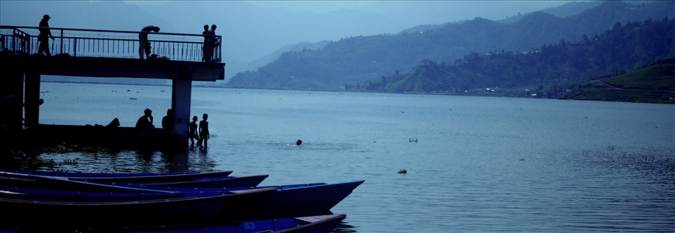 Saying goodbye to Nepal and to the young shadowy figures that joyously jump off the pier into the Phewa.