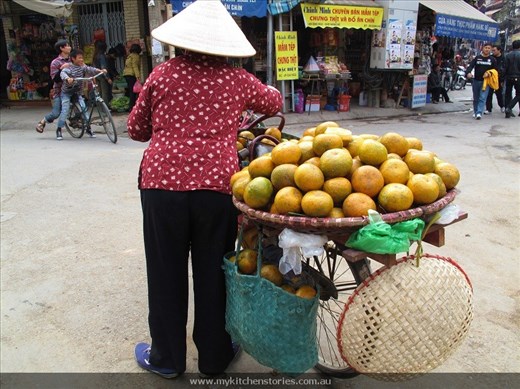 Lady selling oranges