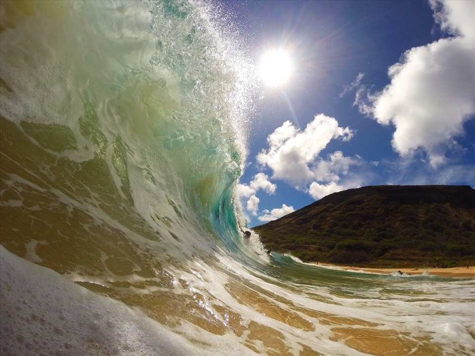 Sandy water eclipsing the sun. 