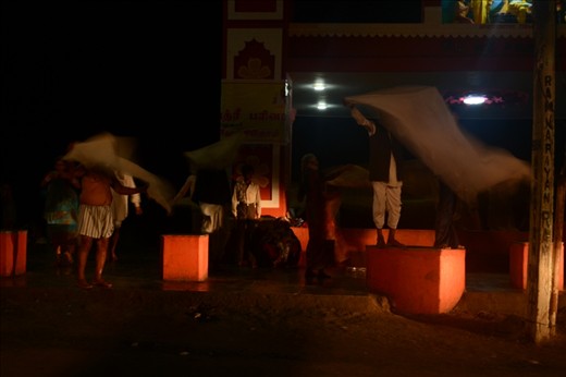 A old man swing their dress after sea bath.... To the scene very impress me at the time.
 place  -  Rameshwaram