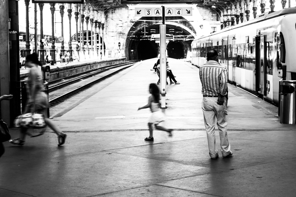 People rushing their way home at one of the beautiful São Bento station.