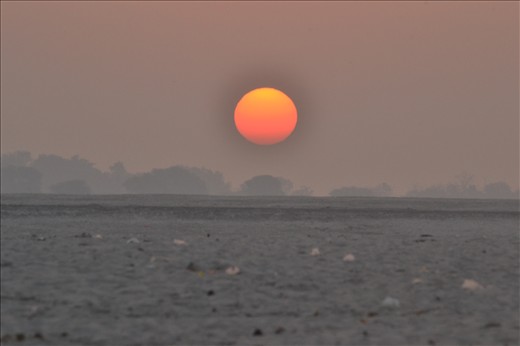 Amazing sunrise in Varanasi shores of the Ganges river.