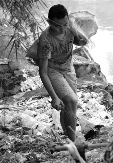 17year old child is currently taking and collecting  trash,garbage,bag it and sell it to get money for his life