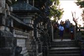 Man walks around the ancient Uluwatu buddhist temple built on a cliff to the ocean in Bali, Indonesia.: by nachobustos, Views[784]