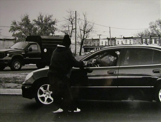 One of the many who stop by to give money to bob on a cold winter day.