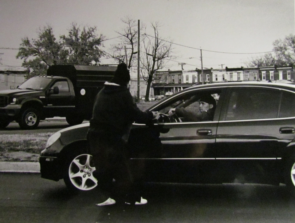 One of the many who stop by to give money to bob on a cold winter day.