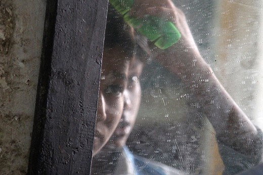 Young trafficked boys recently rescued, learning to groom themselves.