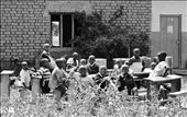 Fun. A group of some of the youngest children in the school sit and hide from us in the makeshift classroom in the courtyard, waiting to show us their outdoor games. They ensure us they are waiting for their teacher.: by natashadevina, Views[365]