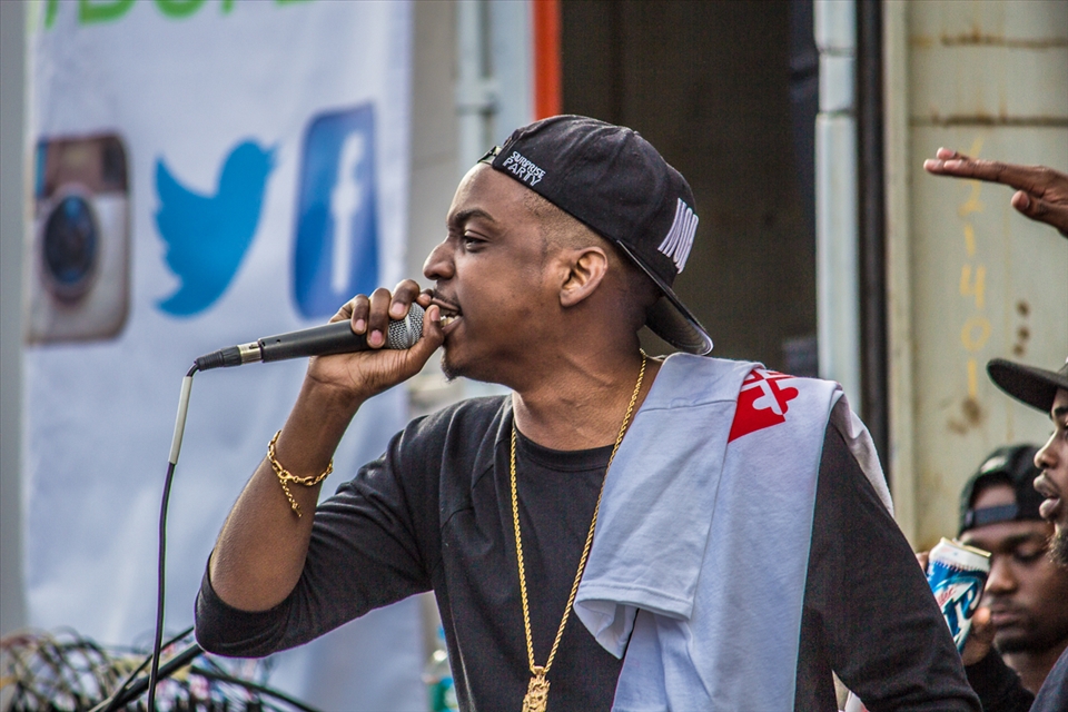 Phil Ade performing at Broccoli City Festival on Earth Day 2013; I really felt like this photo captured and transcends peoples biases. A gold chain and backwards snapback, but the emotion and energy really speaks to me.