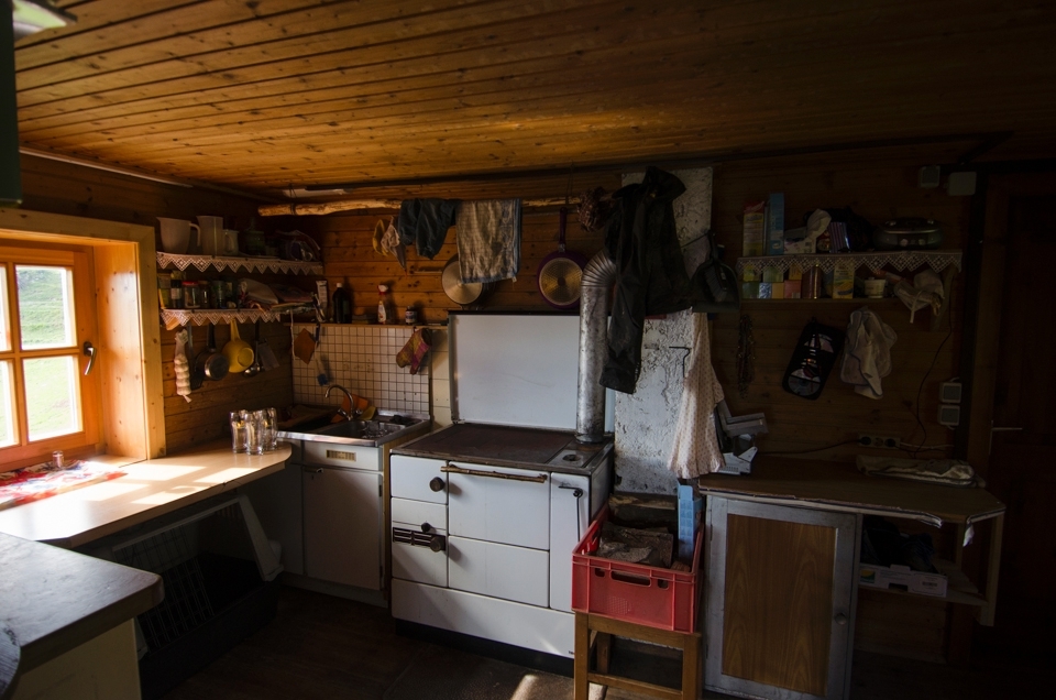 Inside the cabin in the kitchen you have most of the conveniences  of a modern urban home. Running water and an outlet for power.  However,  if you need anything heated including food or water you need  to burn wood.