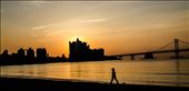 A Korean woman enjoys the sunrise solitude of gwangalli beach in Busan.: by navogel, Views[845]