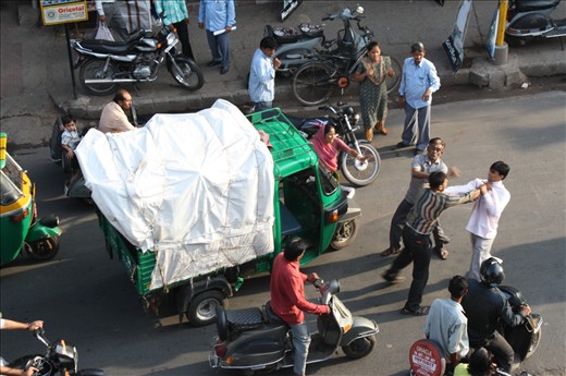 Road rage - As the never ending traffic keeps flowing, you notice a slowdown spot on the road. A fight. Someone is bound to step into someone's toes (tyres) in such traffic!