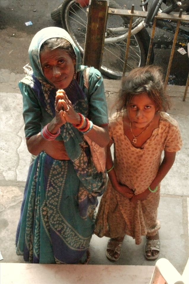 Plead - Its very common in India for people to come up to u and plead for money. if you look different, people will follow you. They are not malicious though, they won't hit u or snatch your belongings. They are just very persistent.
I was climbing a building to get to a vantage point. Seeing me with a camera, she asked for alms. Little did she know it was a borrowed camera. I took a picture and gave her some money. The girl got a gum and walked away happy.