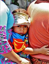 A child seated between his parents on a motorbike in Bali.: by nellietrew, Views[335]
