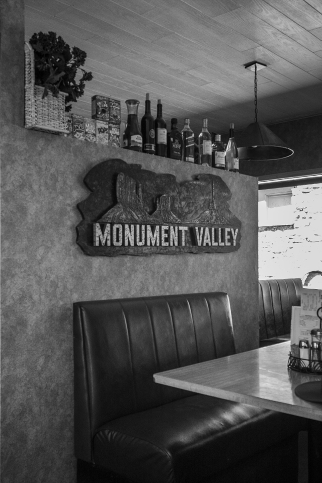 #1: Monument Valley, artistically portrayed on the sign in above the faux-leather couch on the photo is commonly known after its appearances in cigarette ads and the Forrest Gump film is in the heart of the Navajo Nation reservation.

Due to the peculiarities of the legal framework and history, the Navajos in the area try to make a living out of tourism.