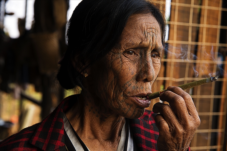 Thangsheng inbetween puffs talks about life as the towns local wine supplier. 