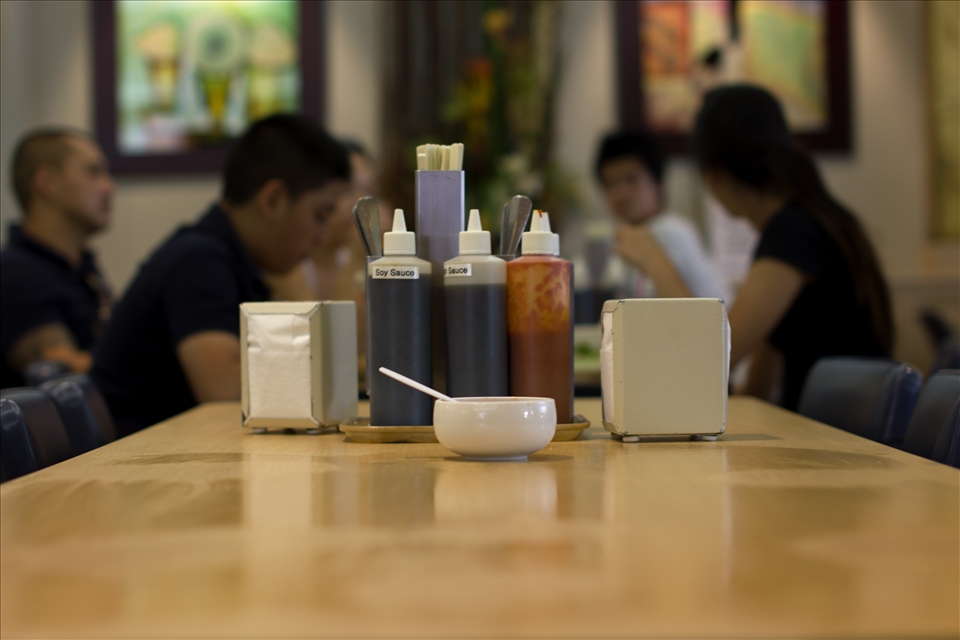 A newly cleaned table, ready for the next group to arrive and consume more Pho.